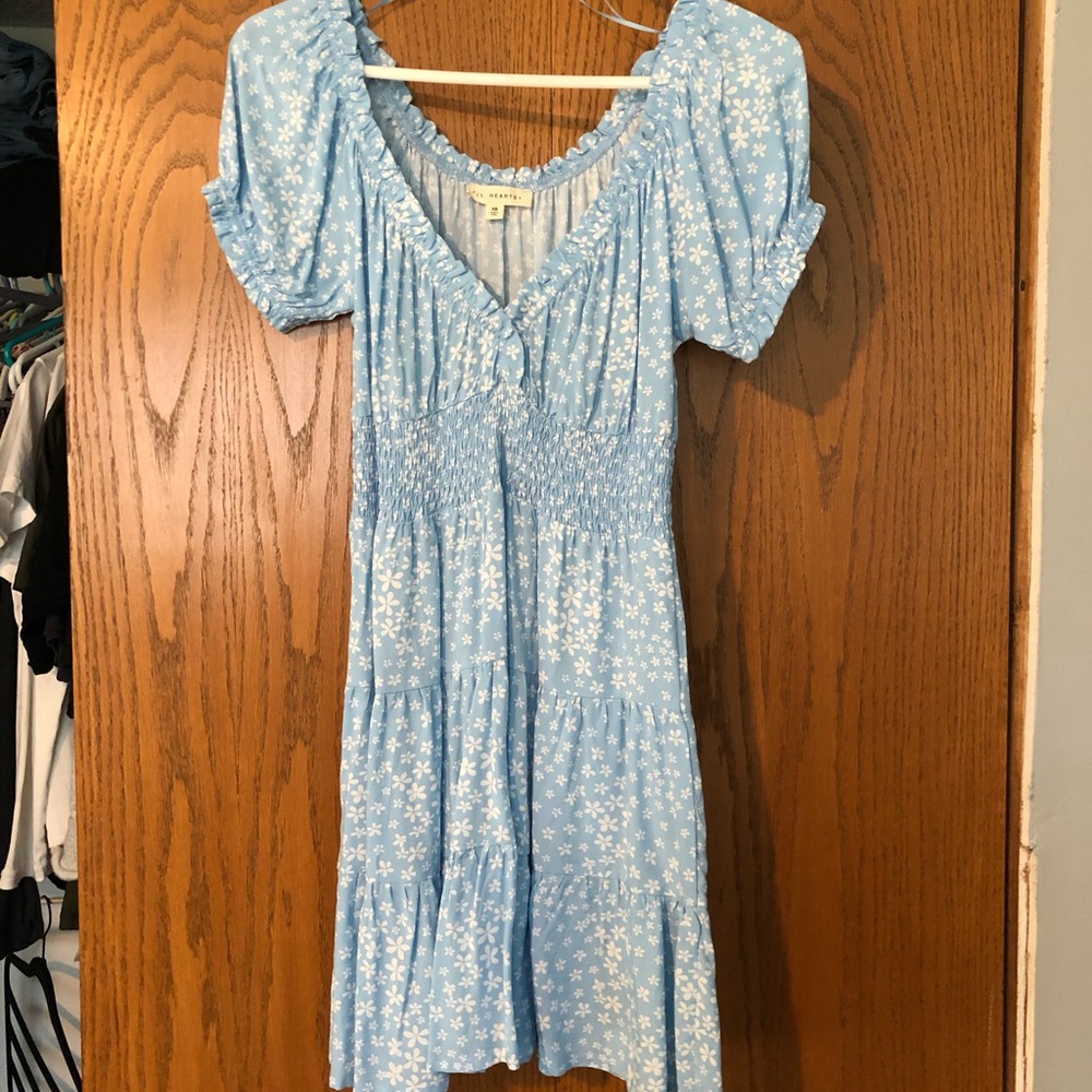 Light blue dress with flowers.